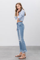 MID RISE LONG BOTTOM FRAYED CROP FLARE